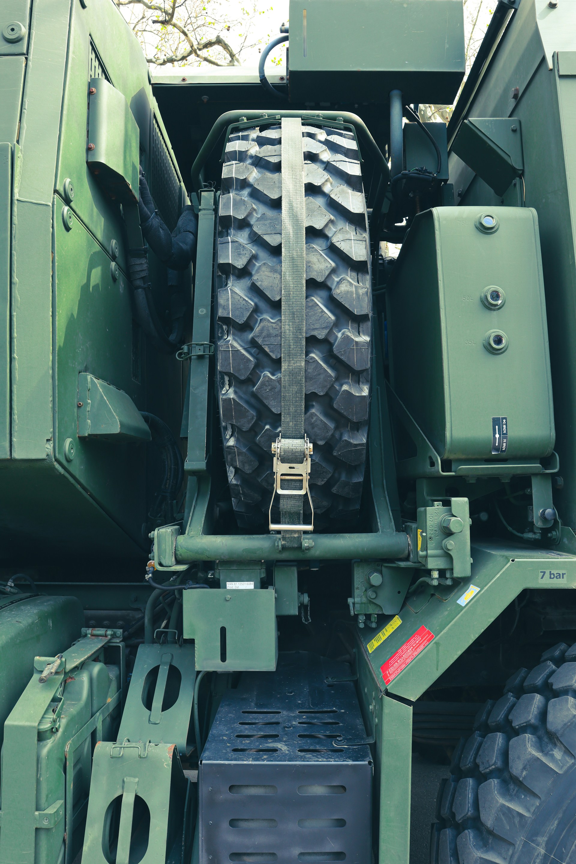 woman wearing yellow long-sleeved dress under white clouds and blue sky during daytime