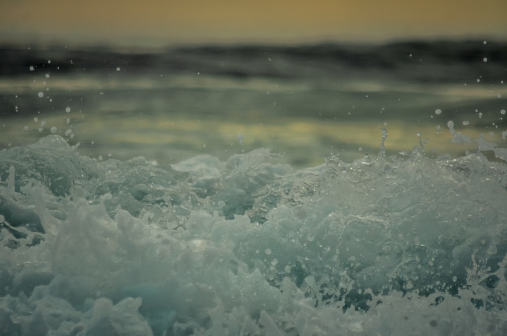 a close up of a wave in the ocean