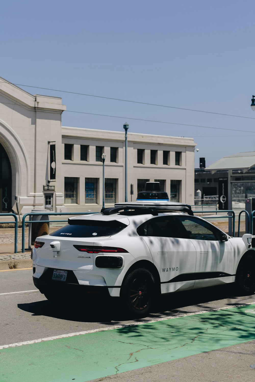 a police car parked in front of a building