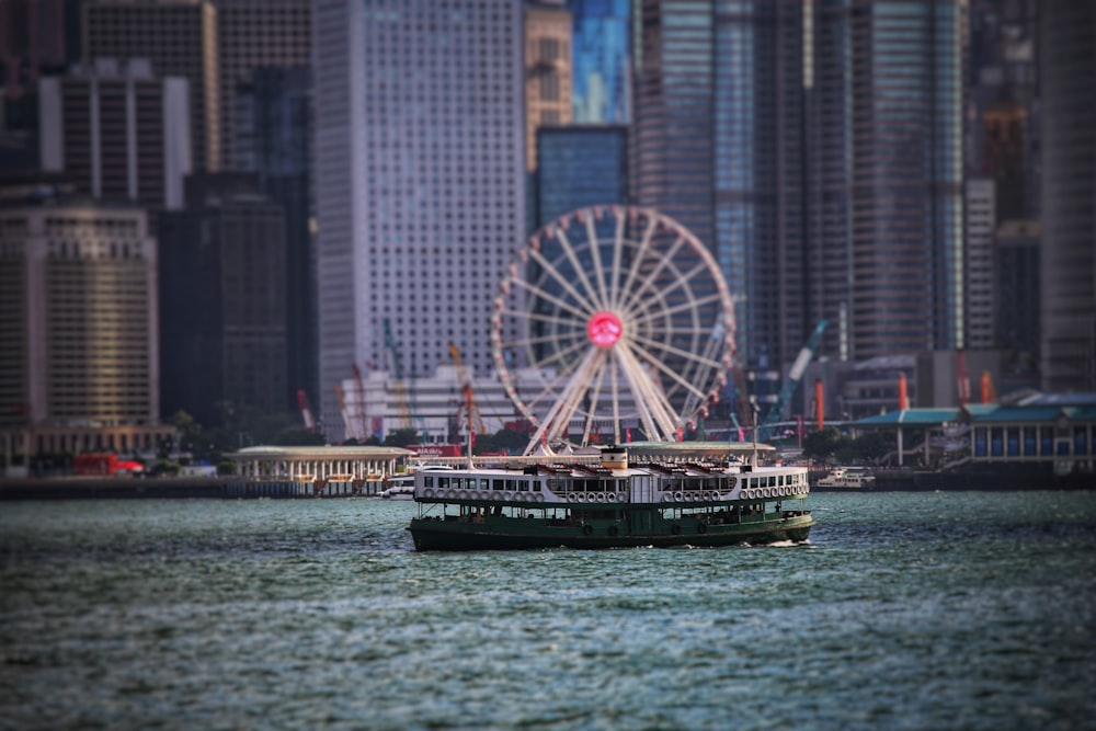 a large ferris wheel in the middle of a large body of water