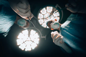 a person is doing something with a pair of scissors