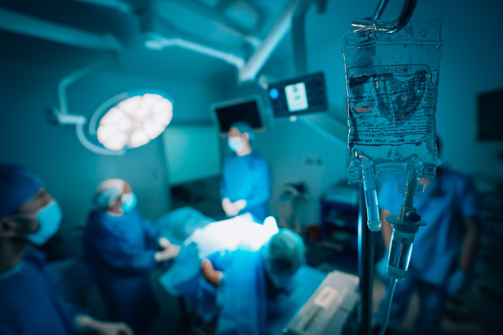 a group of surgeons in a hospital operating room