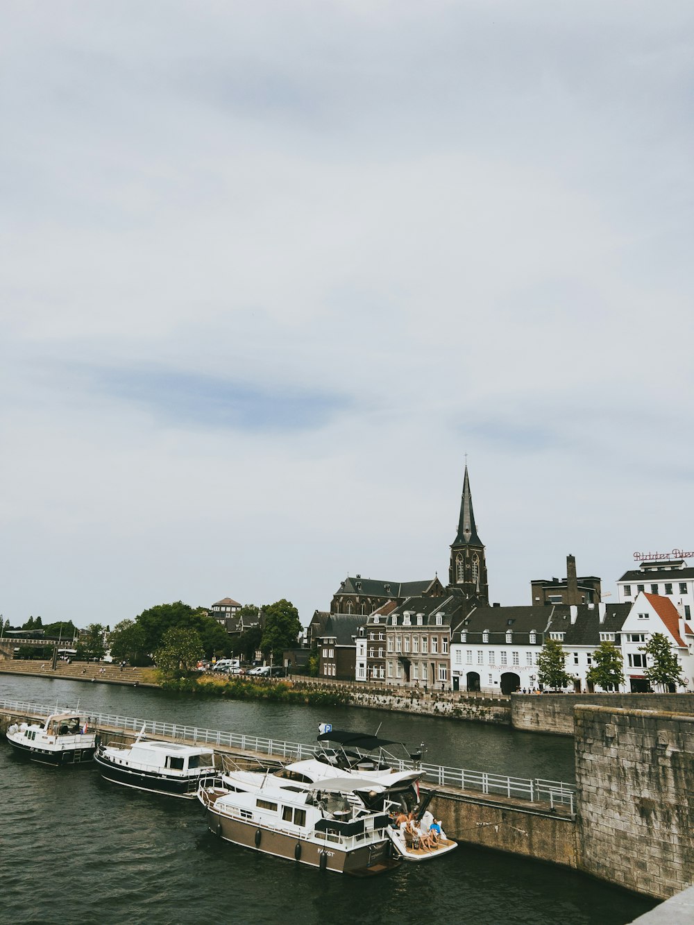 a group of boats that are sitting in the water