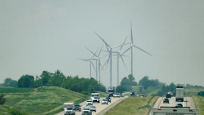 Truck transporting large wind turbine components on a highway in Brazil