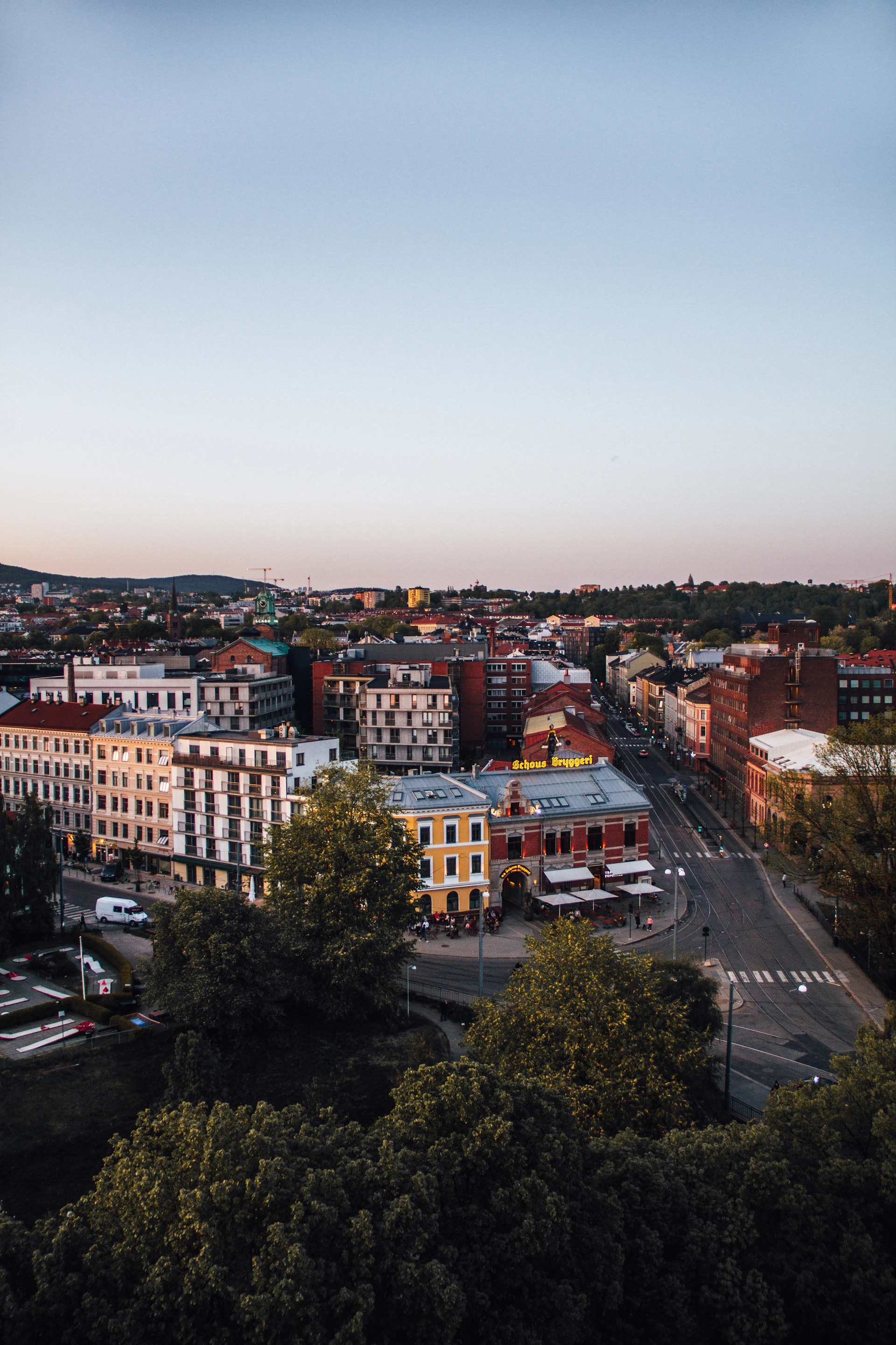 a view of a city from a hill