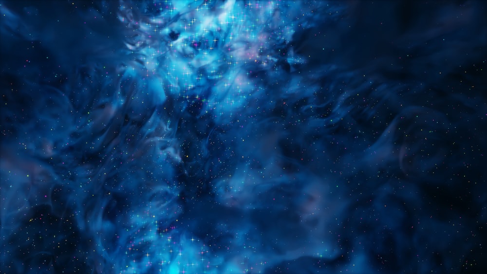 a blue and black space filled with stars