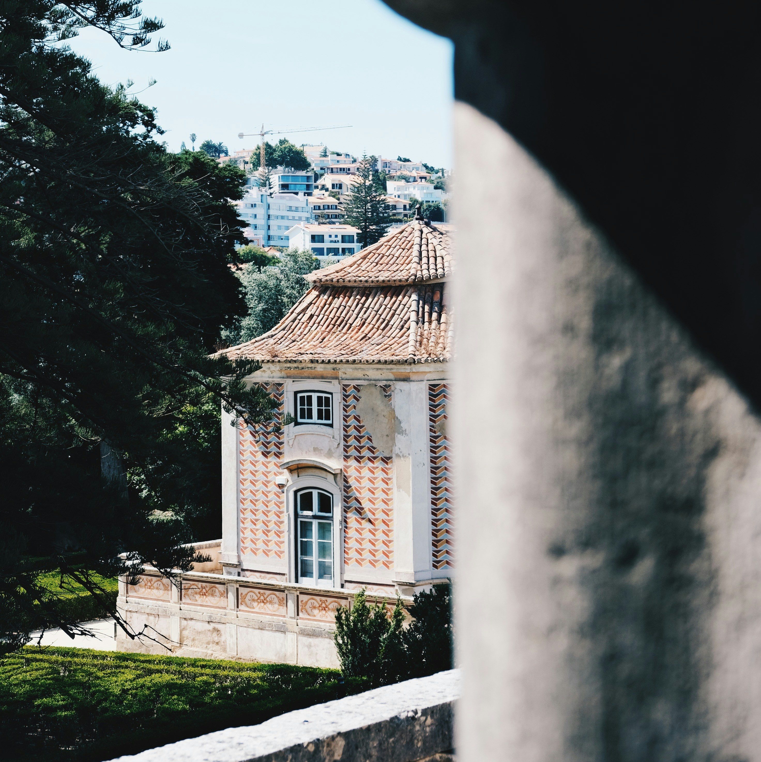 a building with a tower and a clock on the side of it