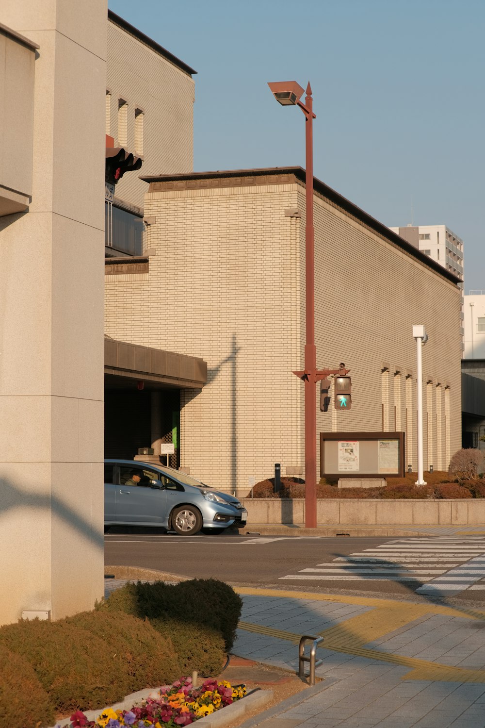 a car is parked in front of a building