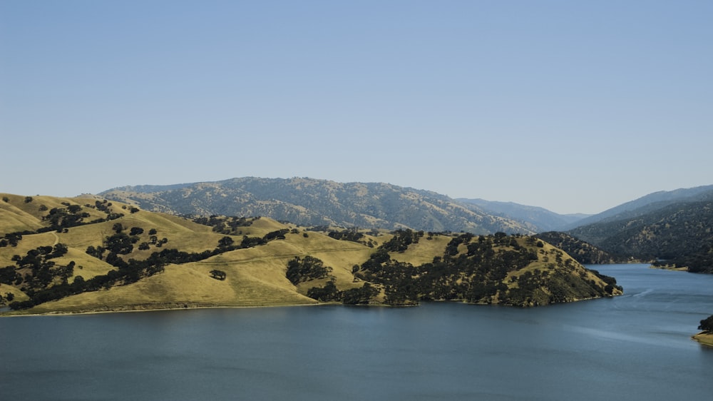 a large body of water surrounded by mountains