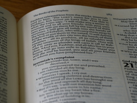 An open book showing text from a religious scripture. The page heading reads 'The Books of the Prophets' and contains detailed text with a heading titled 'Jeremiah’s complaint'. The text is in two columns with numbered verses. The page also has a page number '583' at the top right.