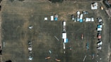 An aerial view of the camp with art installations.