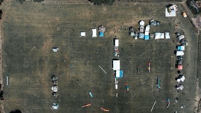 An aerial view of the camp with art installations.