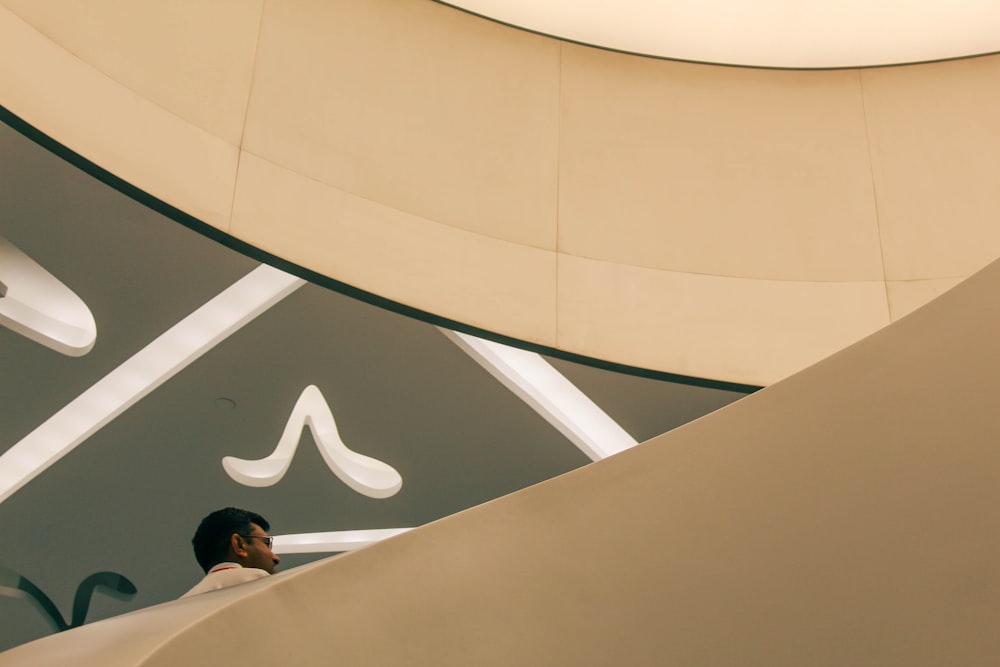 a man is standing in front of a building