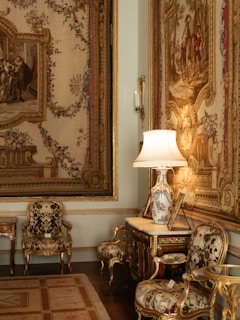 a room with a lot of paintings on the wall
