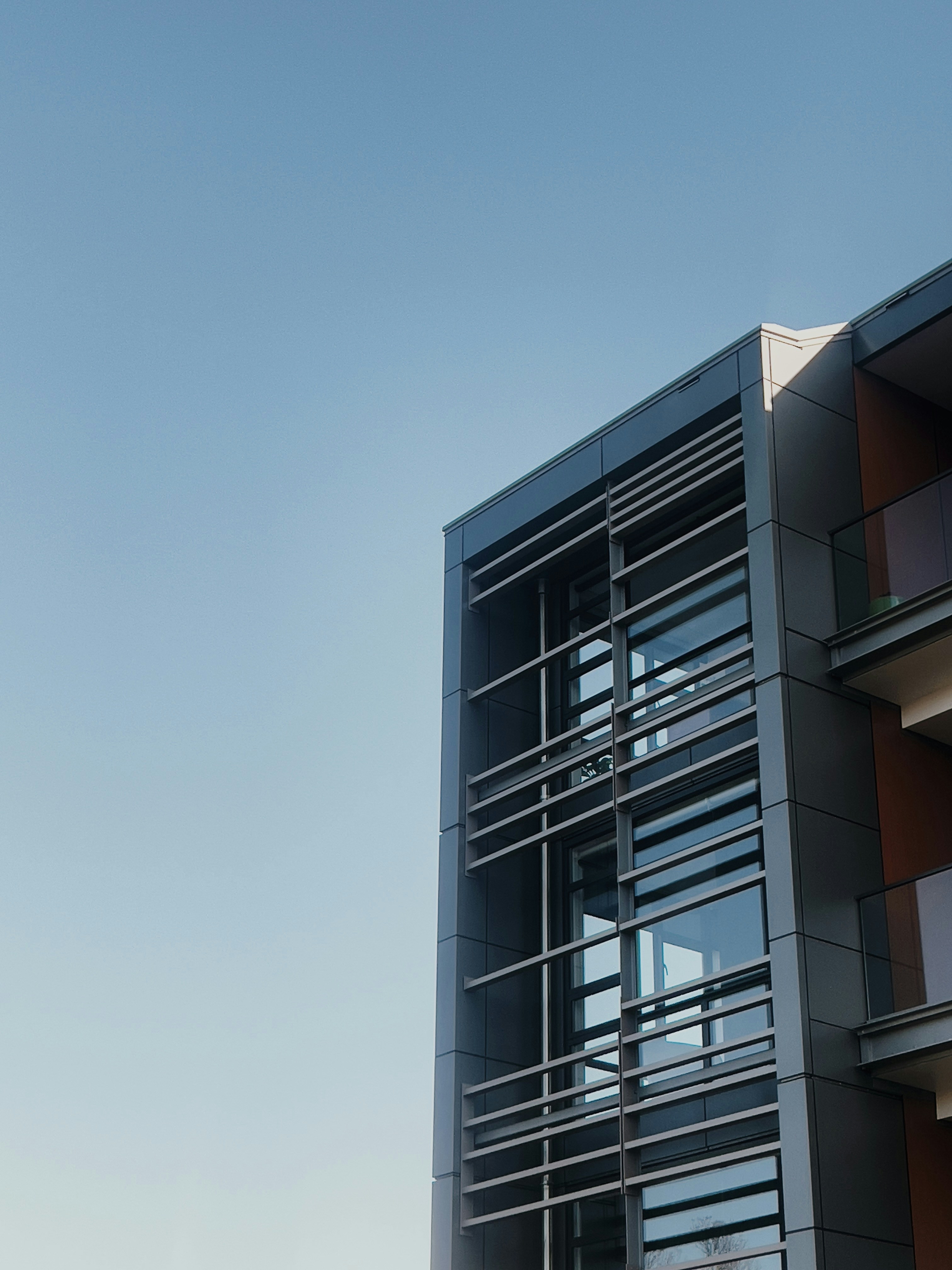 a tall building with a clock on the side of it
