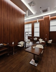 Stylish dining area featuring minimalist decor and harmonious color scheme.