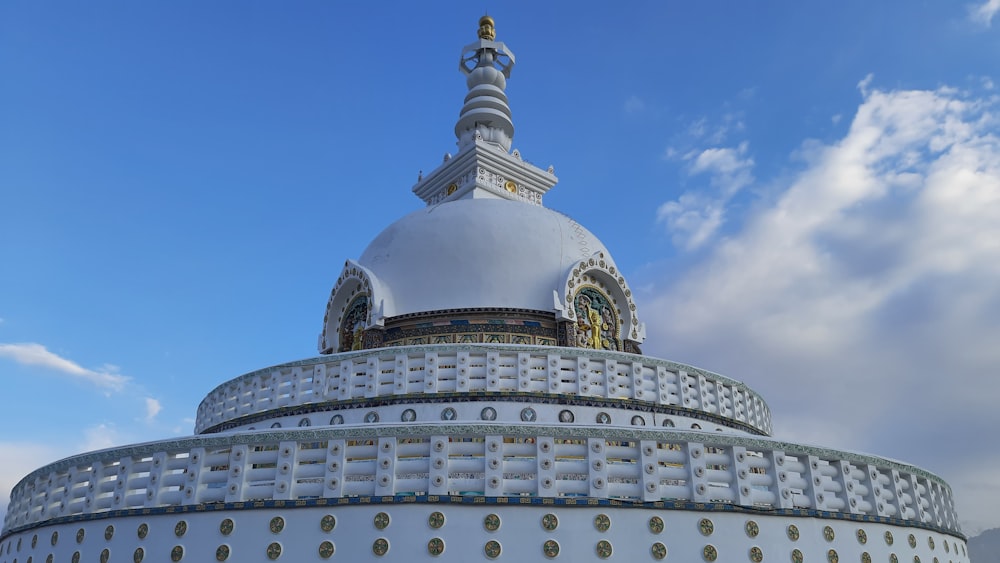 a large white building with a white roof