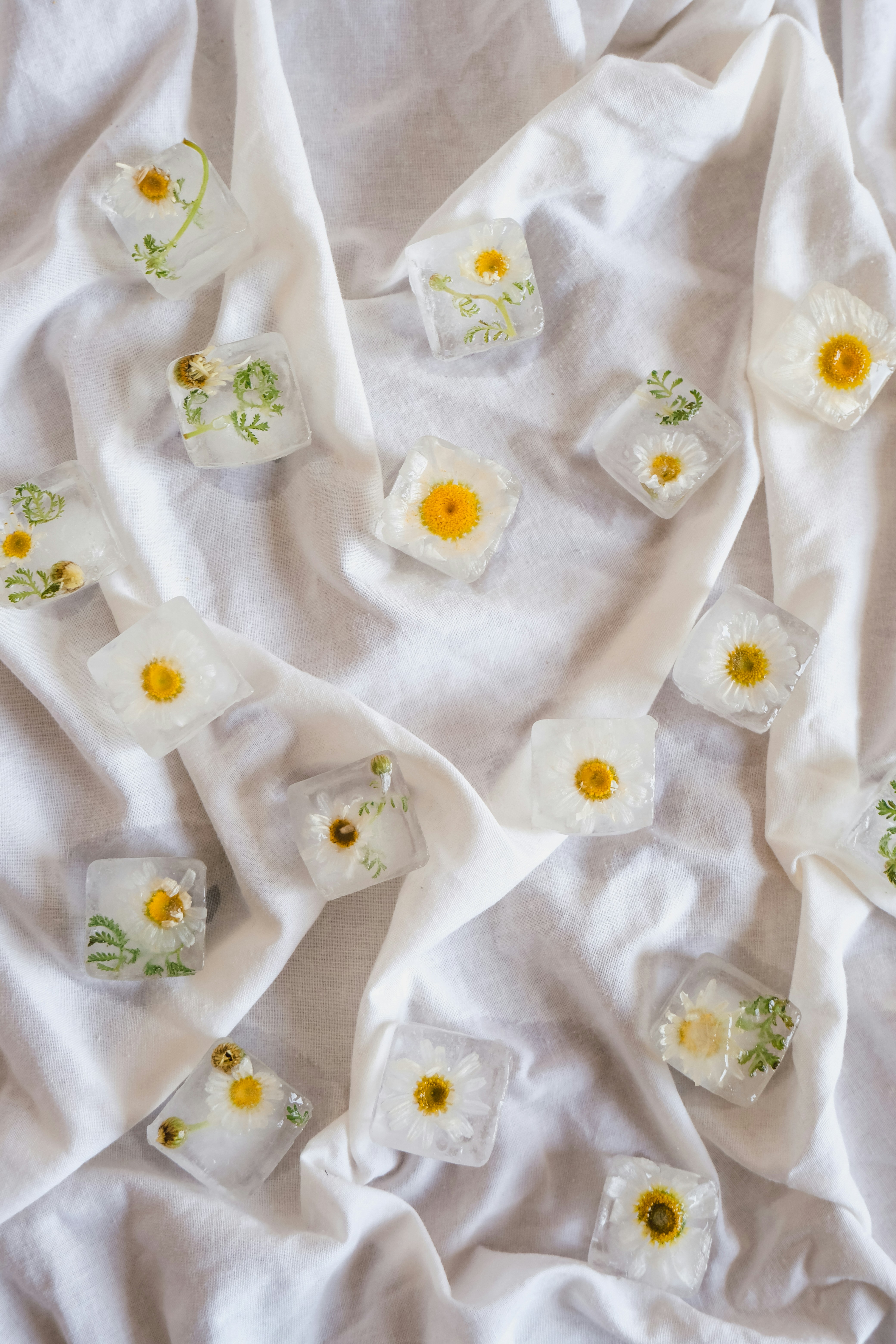 a white sheet with yellow flowers on it