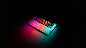 Laptop displaying a vibrant screen with colorful graphics.