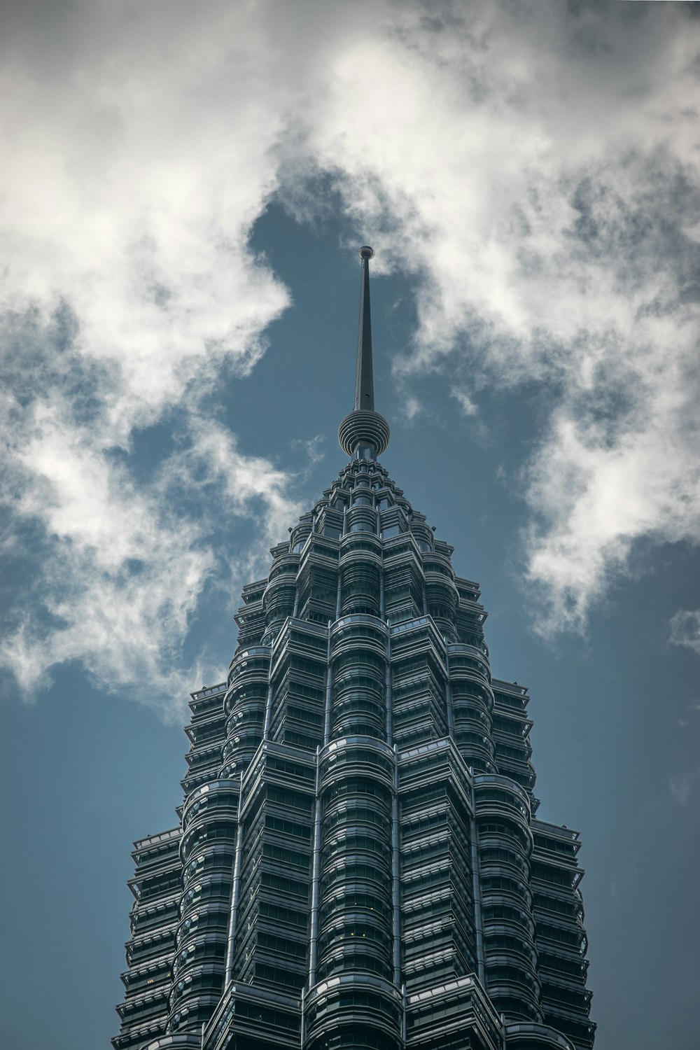 a very tall building with a sky background