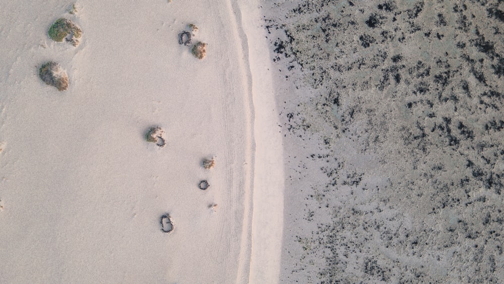 a bird's eye view of a sandy beach