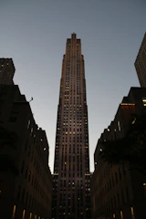 High-quality 3D render of PH Tziara building exterior at dusk with subtle lighting.