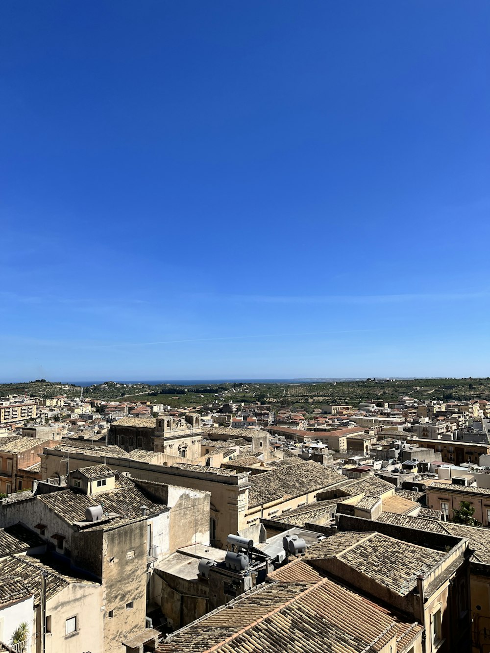 a view of a city from the top of a building