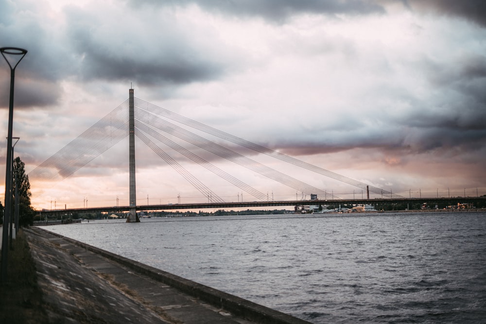 a view of a bridge over a body of water