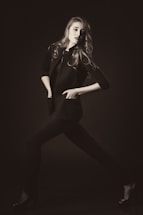 A stylish portrait of a confident individual in trendy attire.