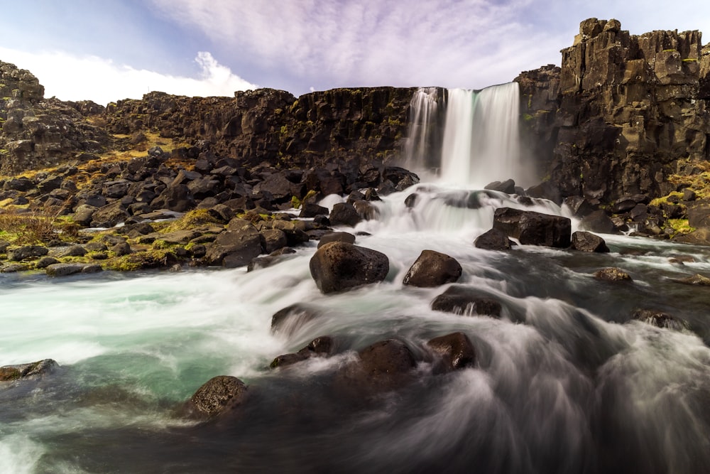 a large waterfall with lots of water coming out of it