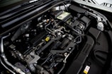 the engine compartment of a car with its hood open