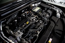 the engine compartment of a car with its hood open