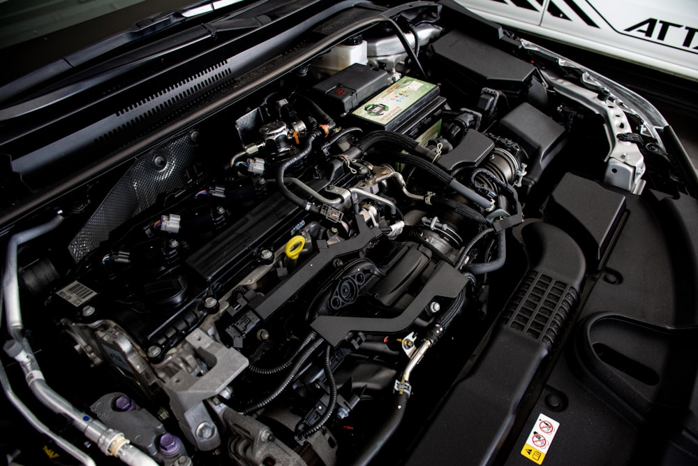 the engine compartment of a car with its hood open