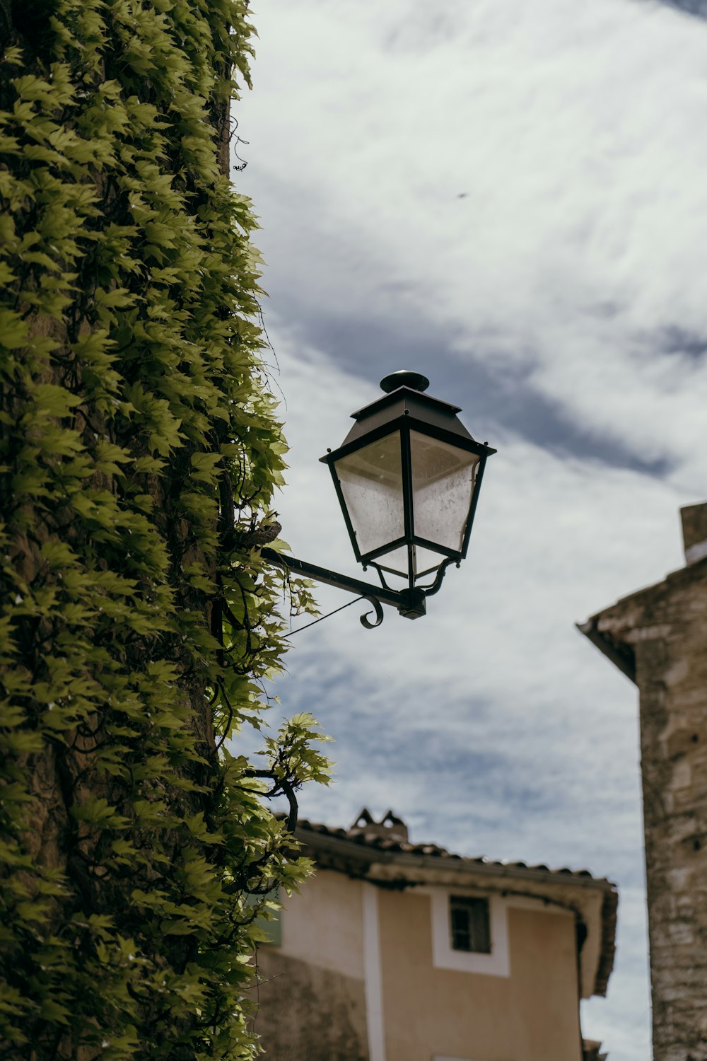 a street light hanging off the side of a building