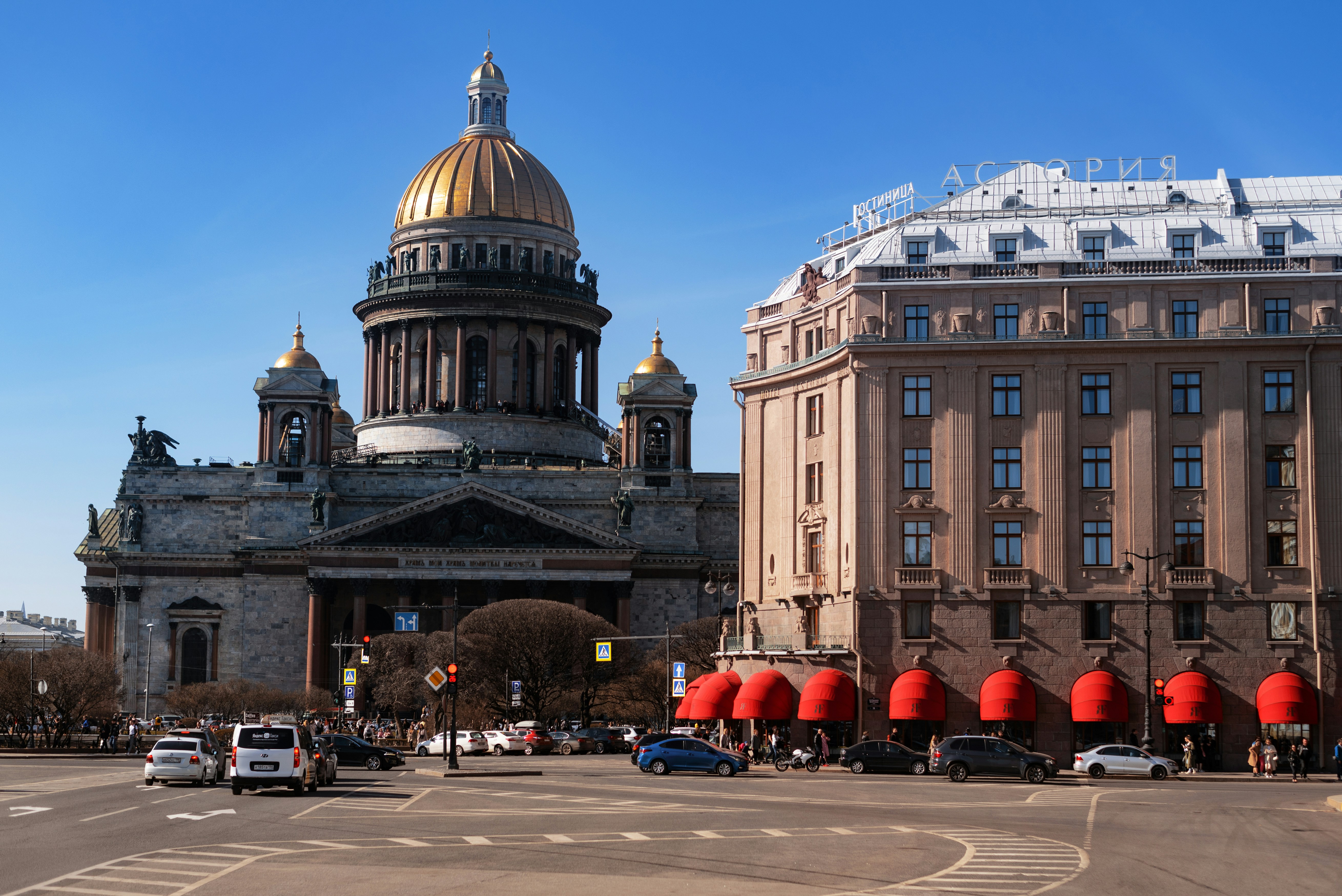 a large building with a golden dome on top of it, 