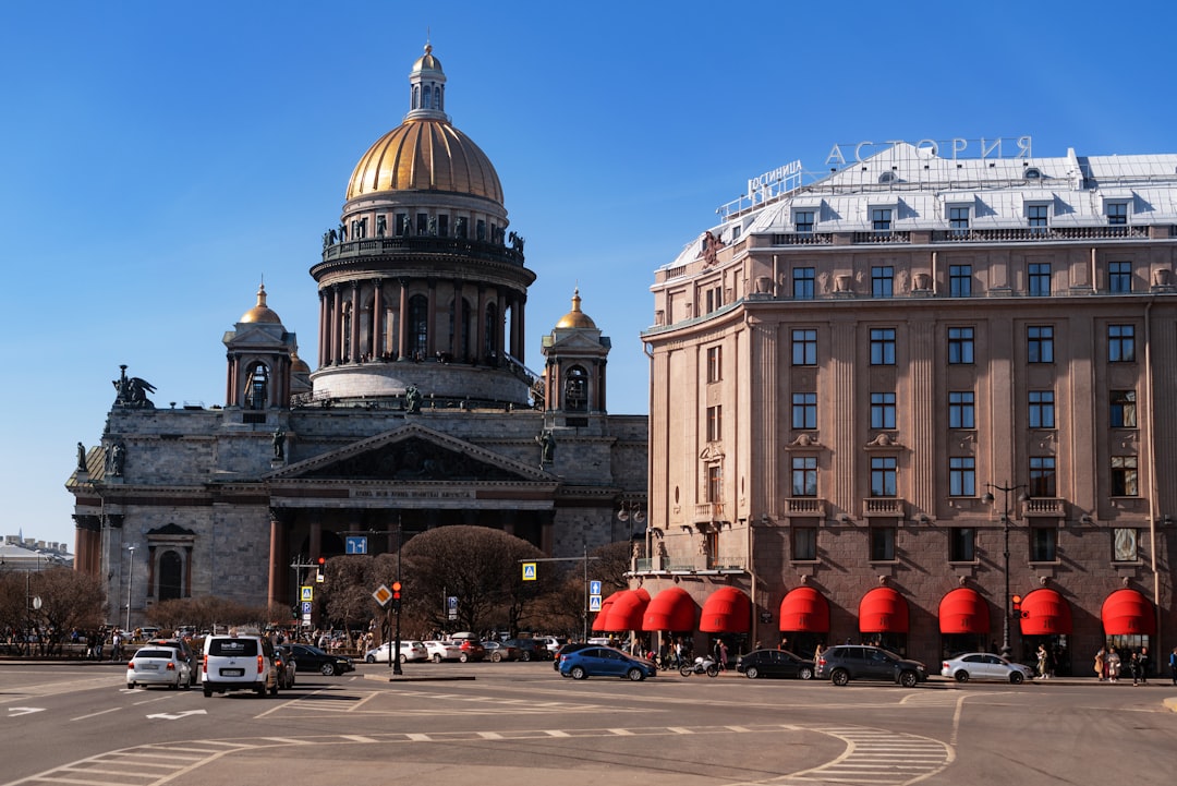 a large building with a golden dome on top of it,