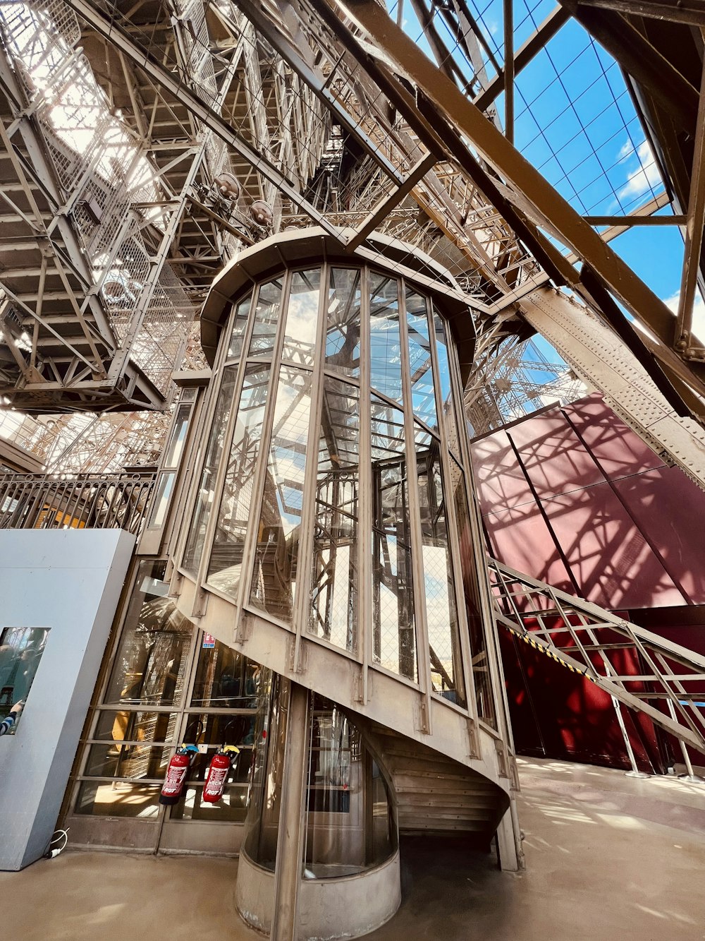 the inside of a building with a spiral staircase