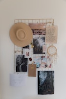 Colorful mood board pinned on a wall with design inspirations.