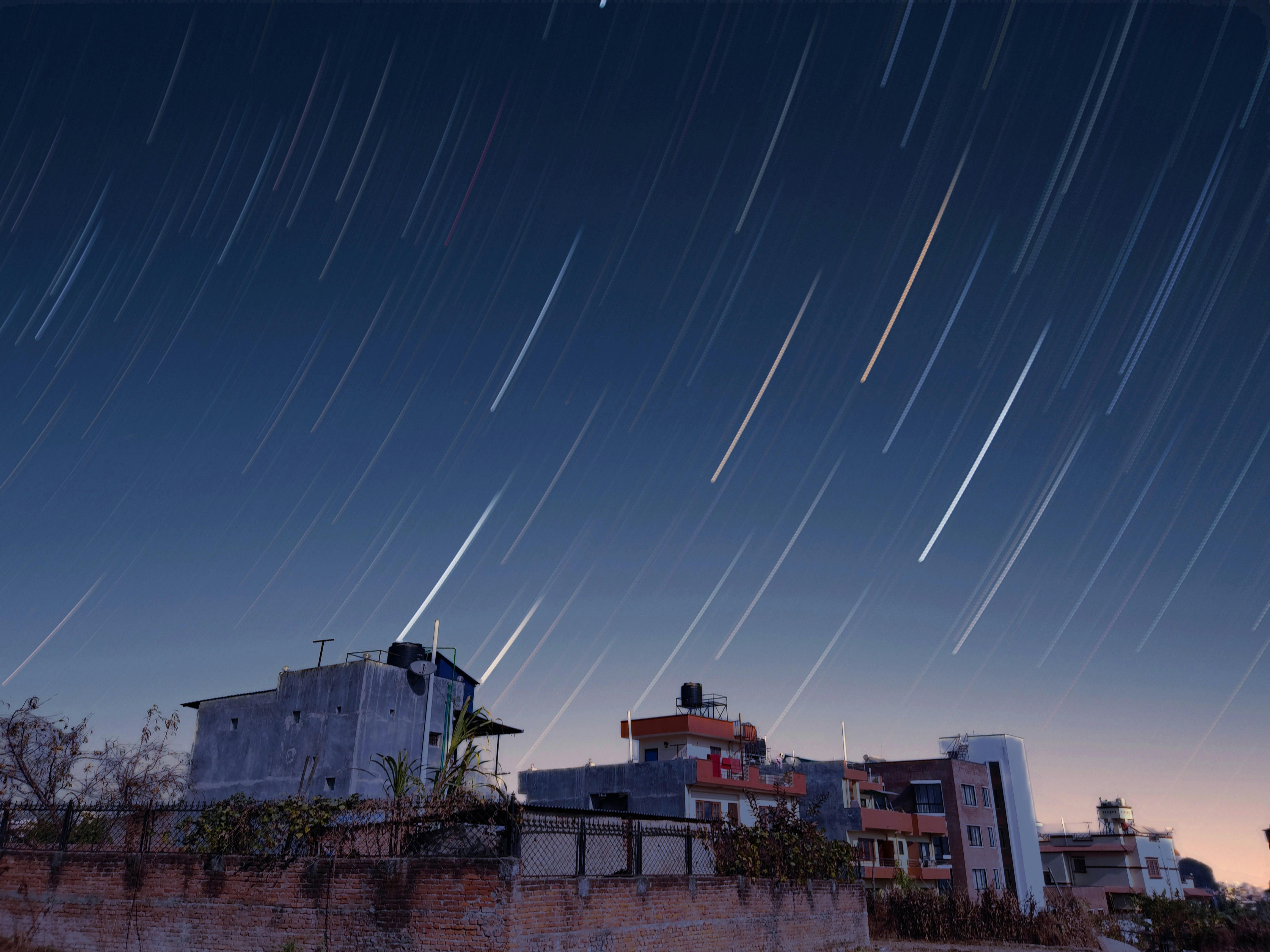 woman wearing yellow long-sleeved dress under white clouds and blue sky during daytime