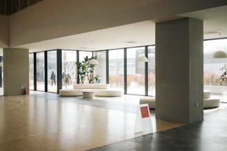 a large room with a basketball court inside of it