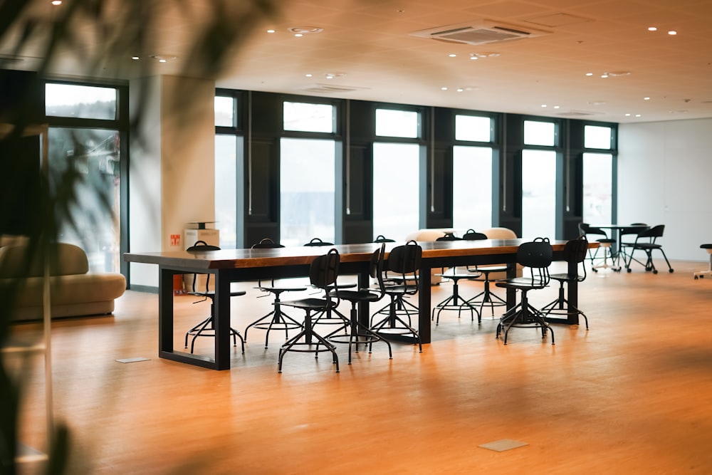 a large room with a long table and chairs