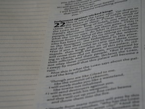 A close-up view of a page from a book with the title 'Judgment against wicked kings' prominently displayed. The text is printed in black on an off-white background, and there are visible lines on the left side suggesting notes can be written there.