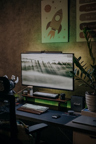 A serene workspace with plants and inspirational quotes on the walls.