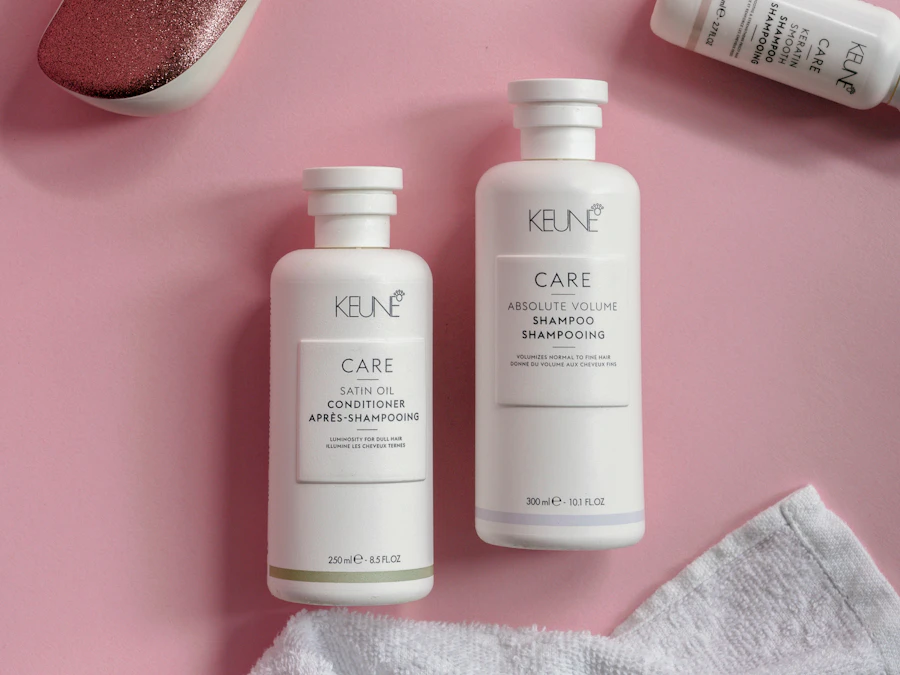 a bottle of keune care and a bottle of shampoo on a pink surface