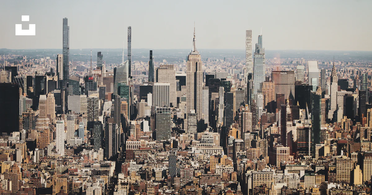 Large Buildingsd A view of a large city with tall buildings photo – Free Cityscape Image ...