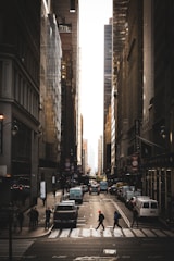 A cinematic shot of a bustling city street at golden hour with dynamic framing