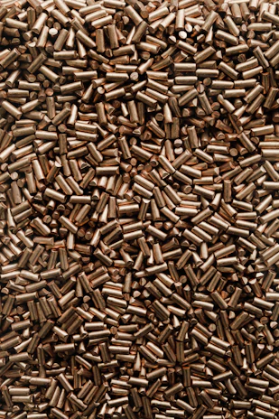 a large amount of bullet casings are shown in this image