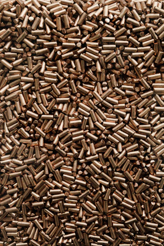 a large amount of bullet casings are shown in this image