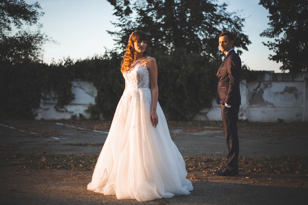 a man and a woman standing next to each other