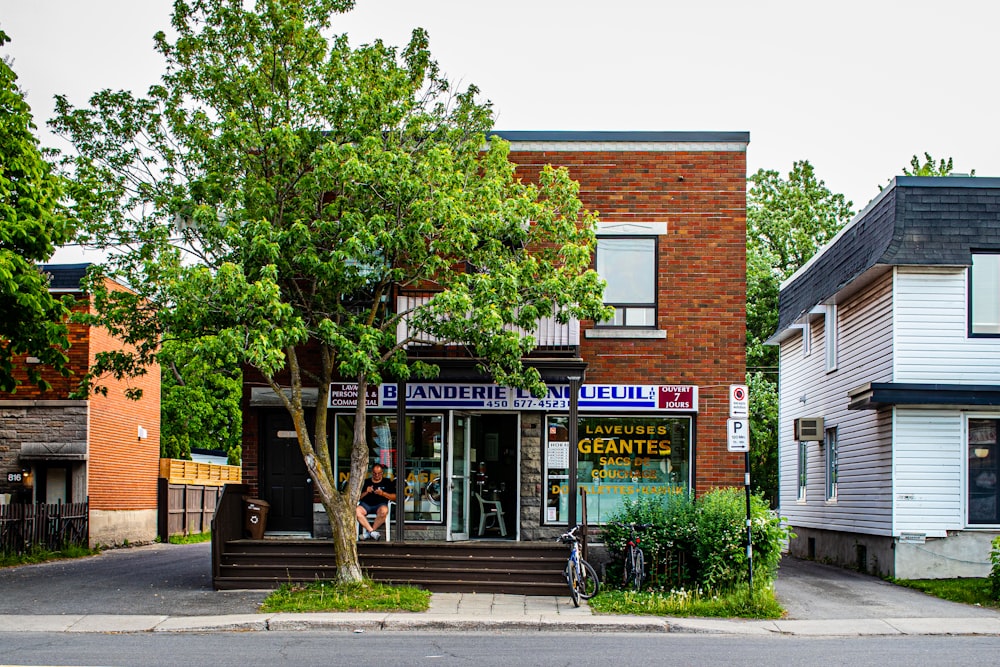 a street corner with a bike parked in front of a store